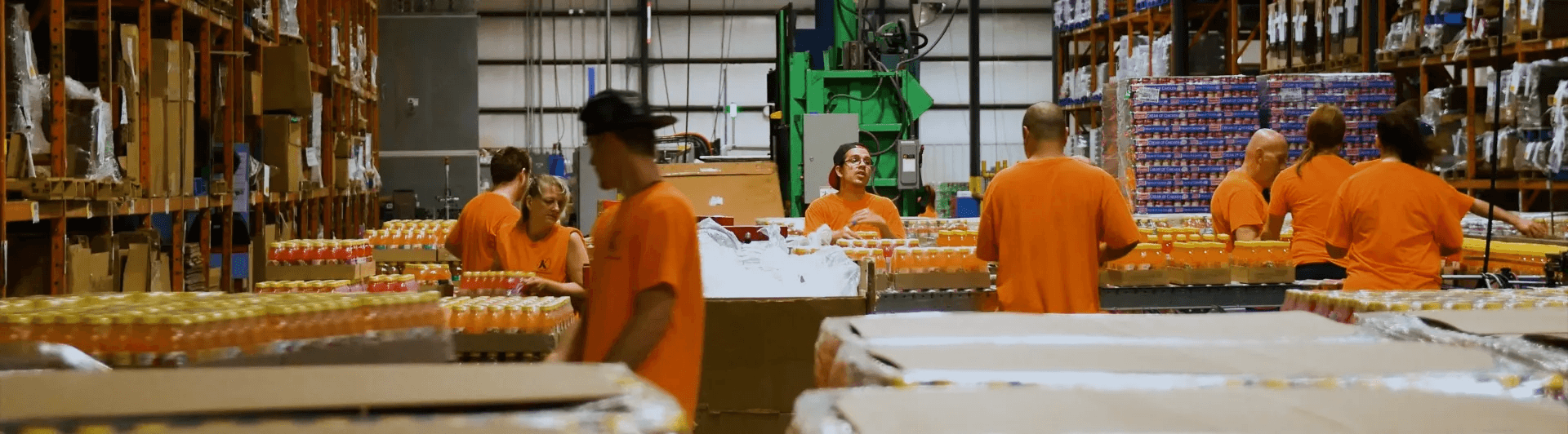 employees working on packaging bottle products