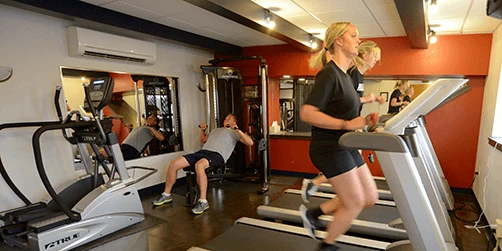 Employees using the fitness room at Keller Logistics Group