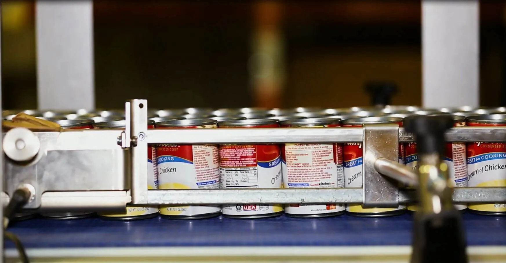 Campbell's Cream of Chicken Soup cans being sorted by Keller Logistics