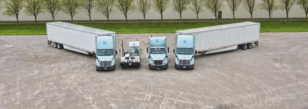 Front view of Keller Trucking Equipment lined up outside