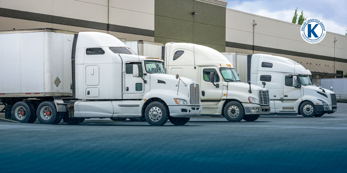 Trucks for third-party logistics sitting in a parking lot